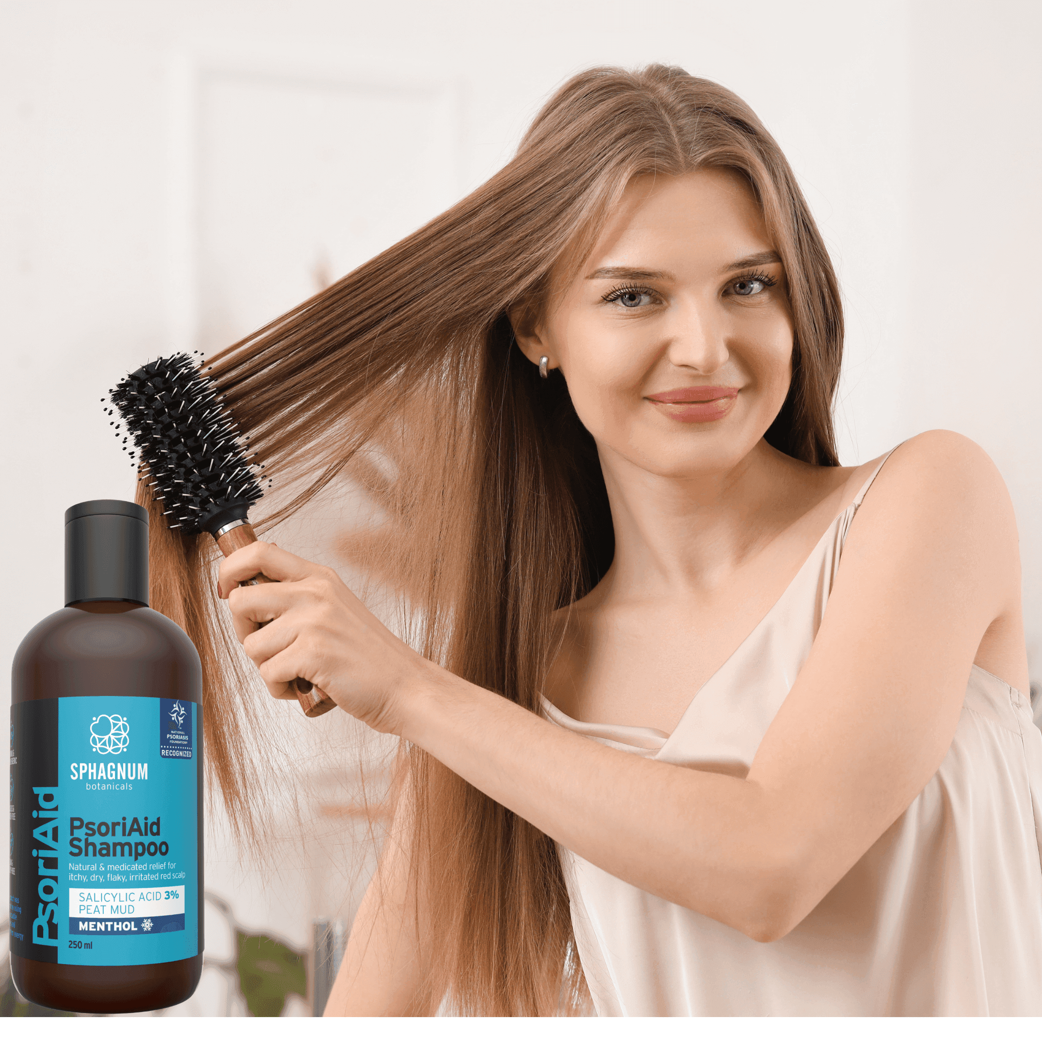 Smiling woman combing straight, fine hair after using Sphagnum Botanicals psoriasis shampoo for dandruff and scalp health.